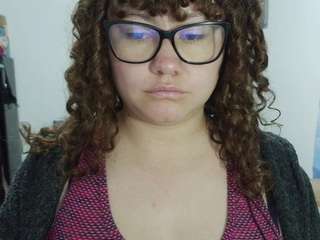 curly-greeneyed webcam preview